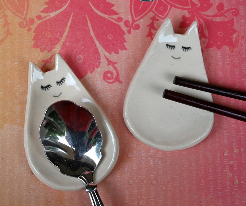 Cat ring holder. Teeny cat trinket dish. Teaspoon rest. Tea bag rest. Pill holder. Chopstick rest. Tea light holder. Kitty ghost