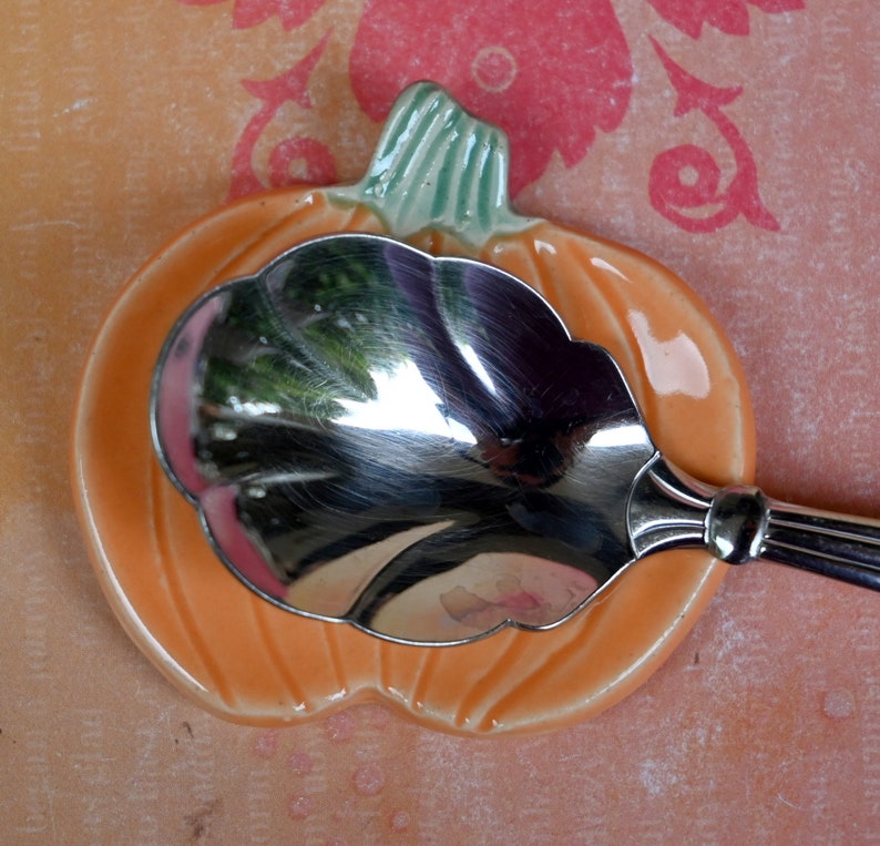 Teaspoon rest. Pumpkin ring holder. Coffee spoon rest. Chopstick rest. Thanksgiving trinket dish. Pill holder. Spooky tea light holder.