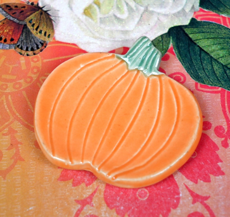 Teaspoon rest. Pumpkin ring holder. Coffee spoon rest. Chopstick rest. Thanksgiving trinket dish. Pill holder. Spooky tea light holder.