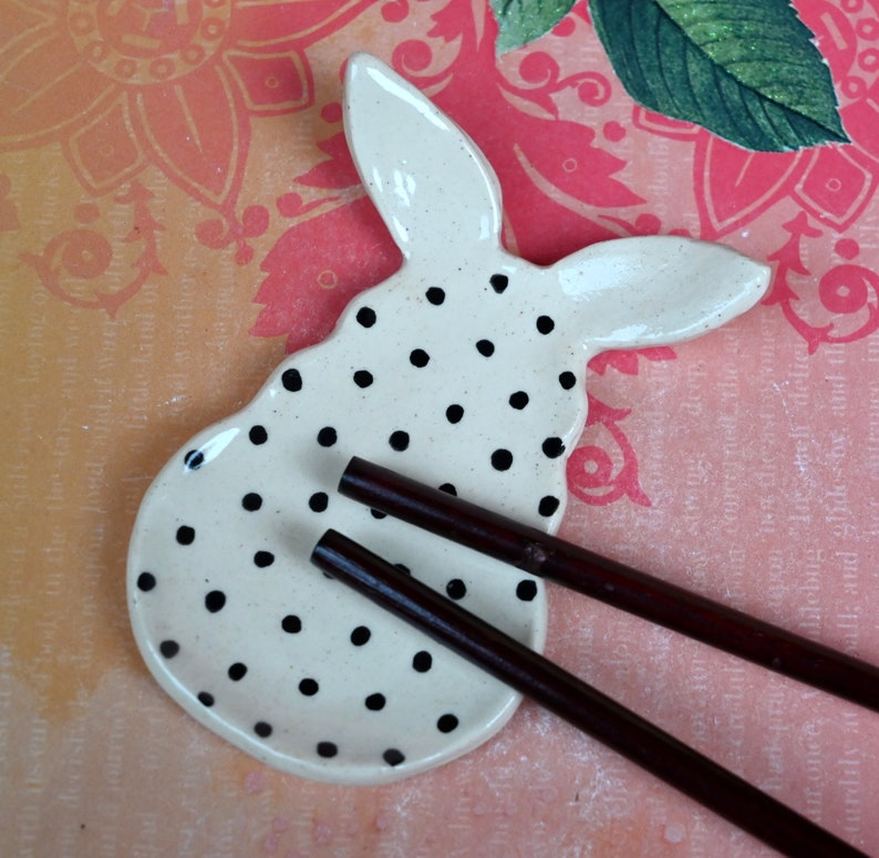 Cotton Tail Bunny ring holder. Polka dot bunny. Tea bag rest. Pill holder. Chopstick rest. Teaspoon rest. Tea light holder. Trinket dish