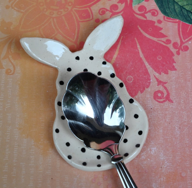 Cotton Tail Bunny ring holder. Polka dot bunny. Tea bag rest. Pill holder. Chopstick rest. Teaspoon rest. Tea light holder. Trinket dish