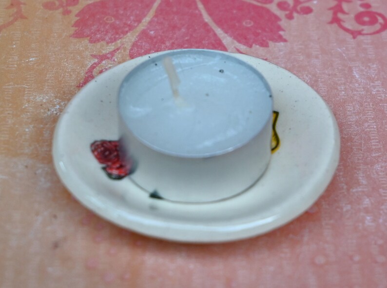 Skull and rose ring holder. Teaspoon rest. Tea bag rest. Spooky skull and rose dish. Pill holder. Chopstick rest. Candy bowl