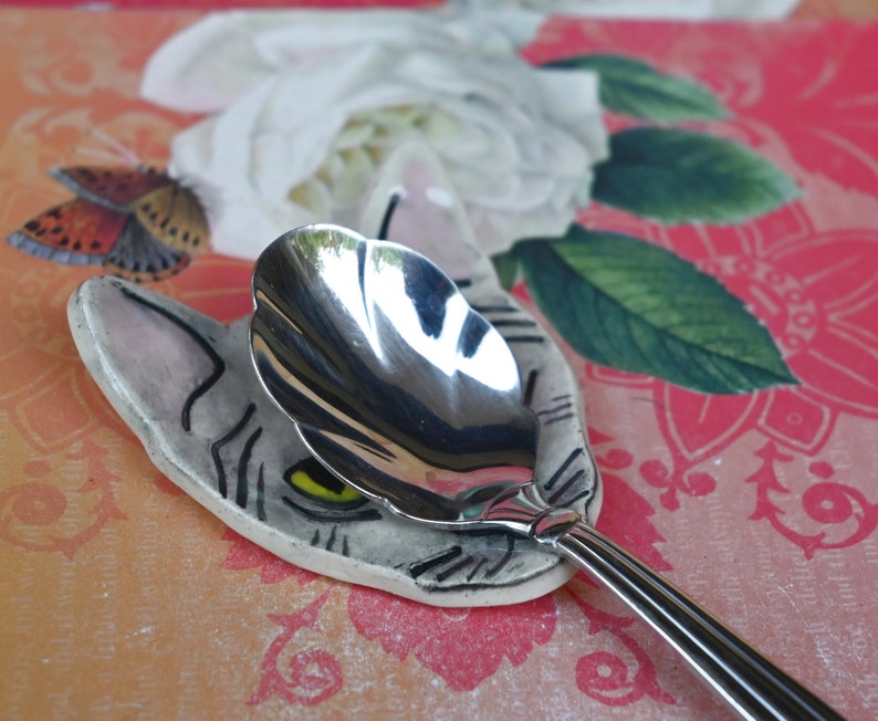 Cat teaspoon rest. Ring holder. Tea bag rest. Cat decoration. Trinket dish. Pill holder. Tea light holder. Chopstick rest. Paint brush rest.