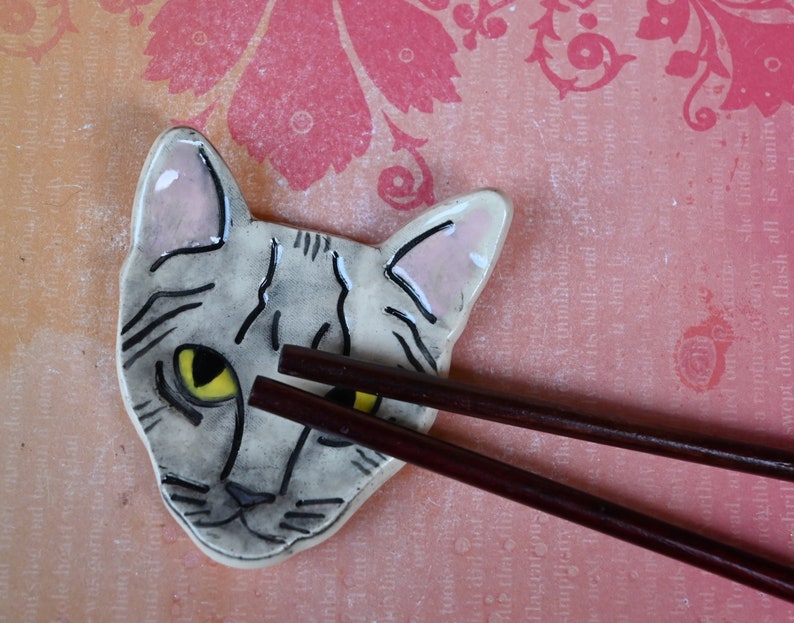 Cat teaspoon rest. Ring holder. Tea bag rest. Cat decoration. Trinket dish. Pill holder. Tea light holder. Chopstick rest. Paint brush rest.
