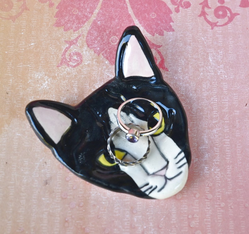 Tuxedo cat teaspoon rest. Ring holder. Trinket dish. Pill holder. Tea light holder. Chopstick rest. Paint brush rest. Pill holder