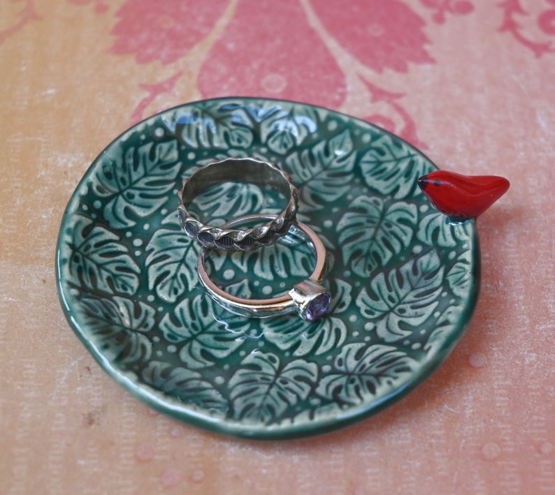 Red Cardinal ring holder. Monstera leaf tea bag rest. Teaspoon rest. Ring holder. Trinket dish. Chopstick rest. Tea light holder.