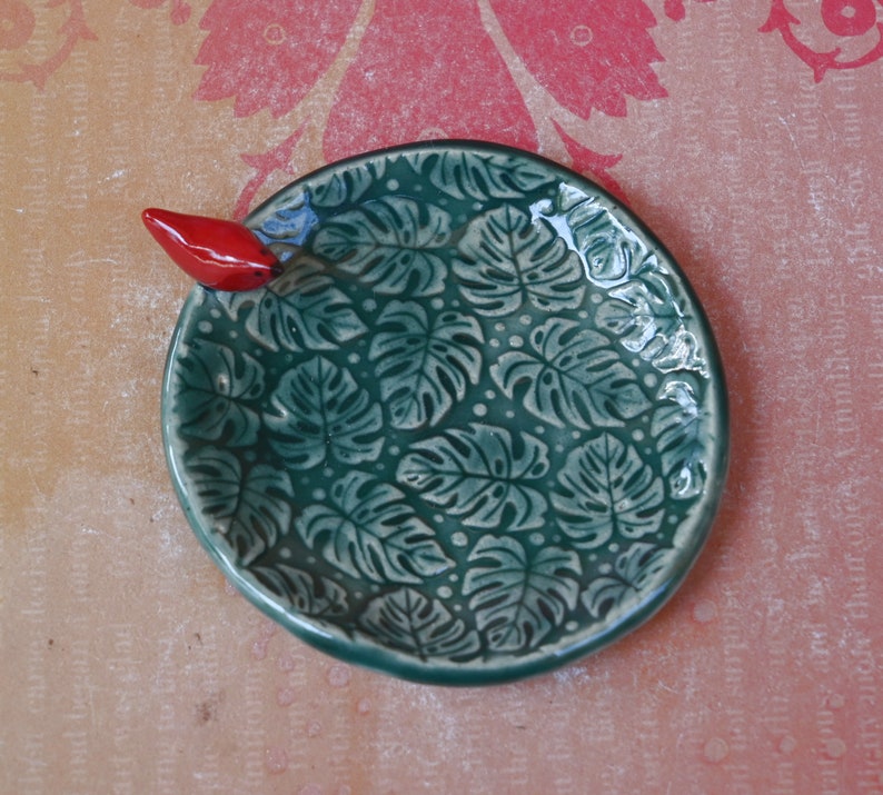 Red Cardinal ring holder. Monstera leaf tea bag rest. Teaspoon rest. Ring holder. Trinket dish. Chopstick rest. Tea light holder.