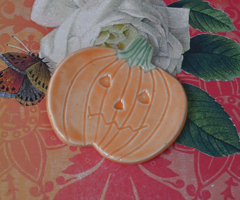 Halloween Teaspoon rest. Pumpkin ring holder. Coffee spoon rest. Chopstick rest. Trinket dish. Pill holder. Spooky tea light holder.