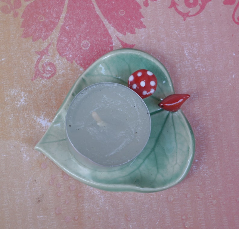 Leaf ring holder. Mushroom ring holder. Pill holder. Chopstick rest. Teaspoon rest. Red cardinal ring holder. Paint brush rest