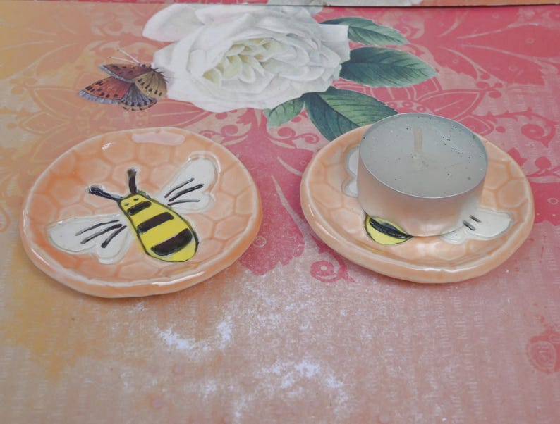 Honeybee teaspoon rest. Hand painted ceramic bee ring holder. Pill holder. Teaspoon rest. Tea bag rest. Tealight holder. Chopstick rest.