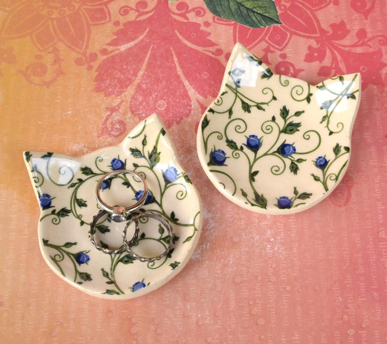 Teeny cat ring holder. Chop stick rest. Teaspoon rest. Tea bag rest. Ceramic cat ring dish. Pill holder. Tea light holder. Blue rose dish.