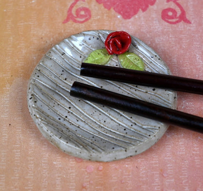 Rose teeny ring holder. Tea bag rest. Teaspoon rest. Coffee spoon rest. Sushi chopstick rest. Tea bag rest. Pill holder. Trinket dish