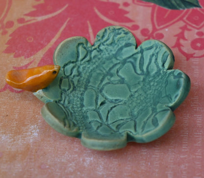 Teeny bird ring holder. Flower ring bowl. Teaspoon rest. Tea bag rest. Coffee spoon rest. Pill holder. Chopstick rest. Teeny trinket dish