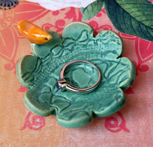 Teeny bird ring holder. Flower ring bowl. Teaspoon rest. Tea bag rest. Coffee spoon rest. Pill holder. Chopstick rest. Teeny trinket dish