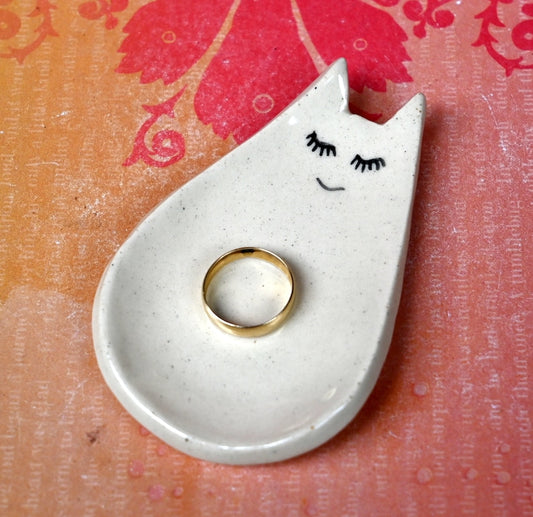 Cat ring holder. Teeny cat trinket dish. Teaspoon rest. Tea bag rest. Pill holder. Chopstick rest. Tea light holder. Kitty ghost