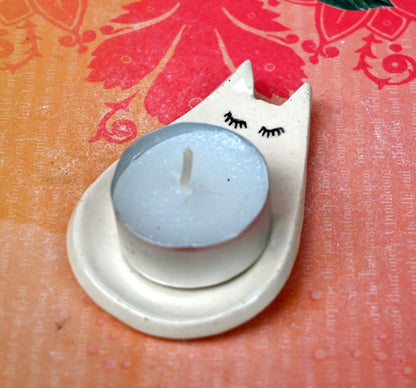Cat ring holder. Teeny cat trinket dish. Teaspoon rest. Tea bag rest. Pill holder. Chopstick rest. Tea light holder. Kitty ghost