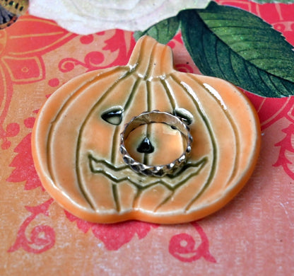 Pumpkin ring holder. Teaspoon rest. Coffee spoon rest. Chopstick rest. Small Halloween trinket dish. Pill holder. Spooky tea light holder.