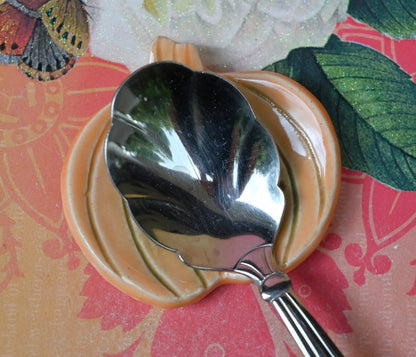 Pumpkin ring holder. Teaspoon rest. Coffee spoon rest. Chopstick rest. Small Halloween trinket dish. Pill holder. Spooky tea light holder.