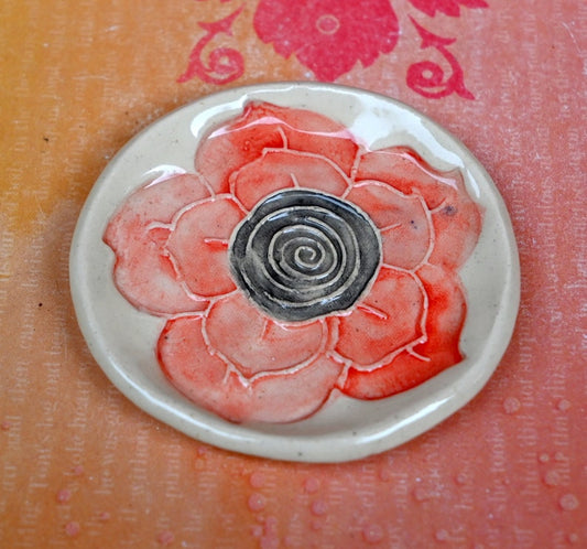 Poppy flower ring holder. Tea bag rest. Teaspoon rest. Coffee spoon rest. Trinket dish. Chopstick rest. Tea light holder. Poppy pill holder