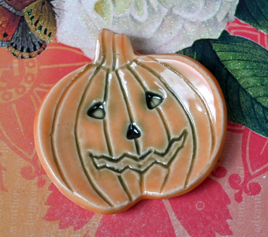 Pumpkin ring holder. Teaspoon rest. Coffee spoon rest. Chopstick rest. Small Halloween trinket dish. Pill holder. Spooky tea light holder.