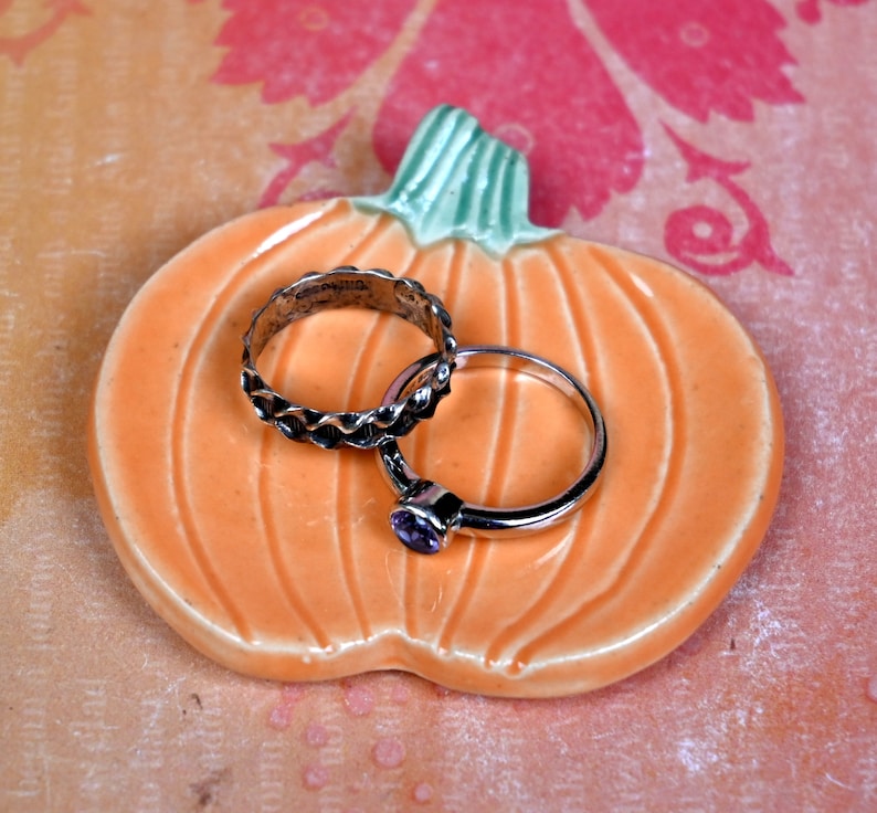 Teaspoon rest. Pumpkin ring holder. Coffee spoon rest. Chopstick rest. Thanksgiving trinket dish. Pill holder. Spooky tea light holder.