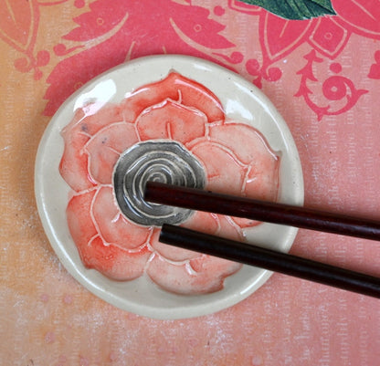 Poppy flower ring holder. Tea bag rest. Teaspoon rest. Coffee spoon rest. Trinket dish. Chopstick rest. Tea light holder. Poppy pill holder