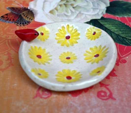 Red Cardinal ring holder. Daisy dish. Tea bag holder. Teaspoon rest. Coffee spoon rest. . Trinket dish. Chopstick rest. Tea light holder