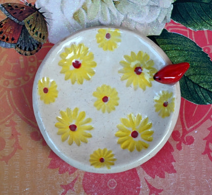 Red Cardinal ring holder. Daisy dish. Tea bag holder. Teaspoon rest. Coffee spoon rest. . Trinket dish. Chopstick rest. Tea light holder