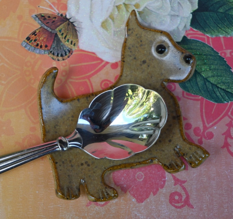Teeny dog ring holder. Tea bag rest. Teaspoon rest. Coffee spoon rest. Tea bag rest. Scottish Terrier. Chopstick rest. Trinket dish. Scottie