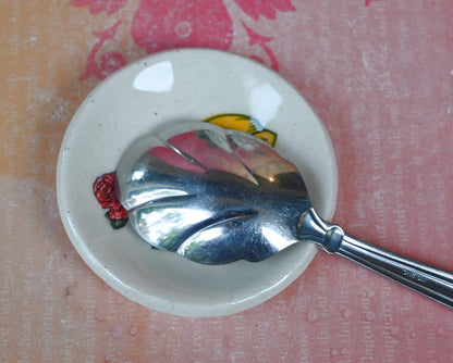 Skull and rose ring holder. Teaspoon rest. Tea bag rest. Spooky skull and rose dish. Pill holder. Chopstick rest. Candy bowl