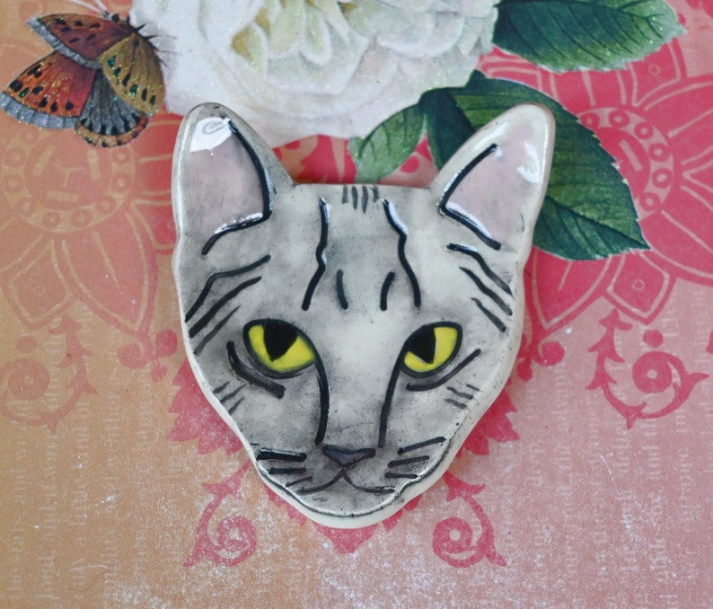 Cat teaspoon rest. Ring holder. Tea bag rest. Cat decoration. Trinket dish. Pill holder. Tea light holder. Chopstick rest. Paint brush rest.