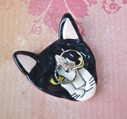 Tuxedo cat teaspoon rest. Ring holder. Trinket dish. Pill holder. Tea light holder. Chopstick rest. Paint brush rest. Pill holder