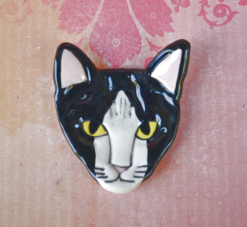 Tuxedo cat teaspoon rest. Ring holder. Trinket dish. Pill holder. Tea light holder. Chopstick rest. Paint brush rest. Pill holder