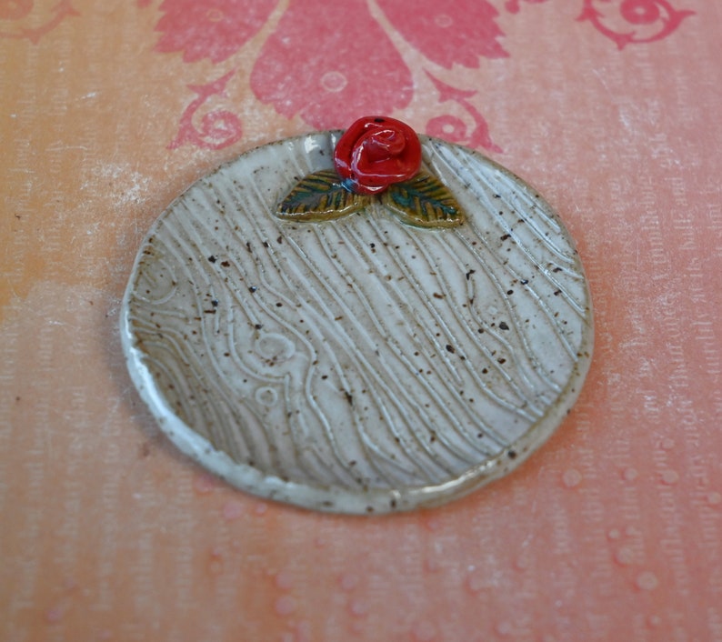 Rose teeny ring holder. Tea bag rest. Teaspoon rest. Coffee spoon rest. Sushi chopstick rest. Tea bag rest. Pill holder. Trinket dish