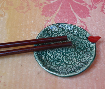 Red Cardinal ring holder. Monstera leaf tea bag rest. Teaspoon rest. Ring holder. Trinket dish. Chopstick rest. Tea light holder.