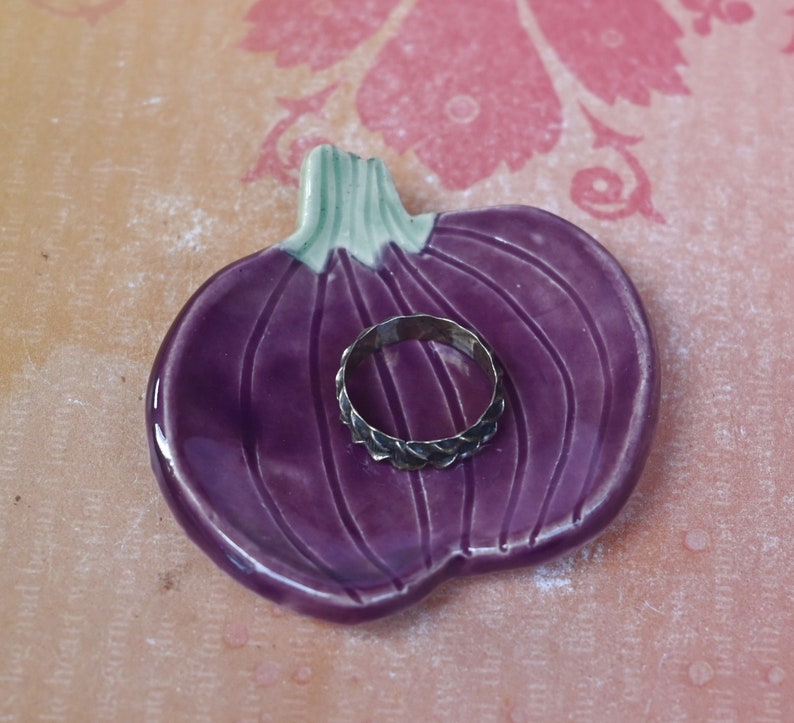 Teaspoon rest. Pumpkin ring holder. Coffee spoon rest. Chopstick rest. Thanksgiving trinket dish. Pill holder. Spooky tea light holder.