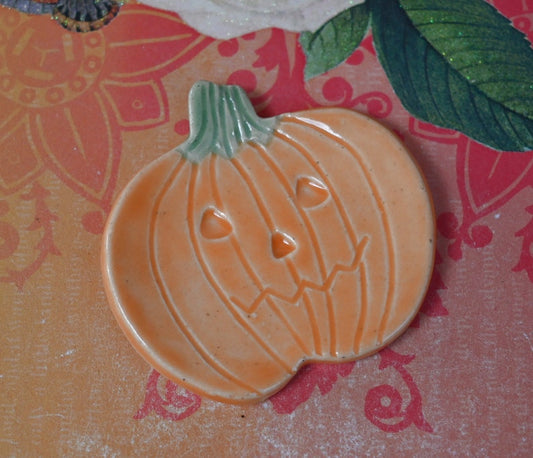 Halloween Teaspoon rest. Pumpkin ring holder. Coffee spoon rest. Chopstick rest. Trinket dish. Pill holder. Spooky tea light holder.