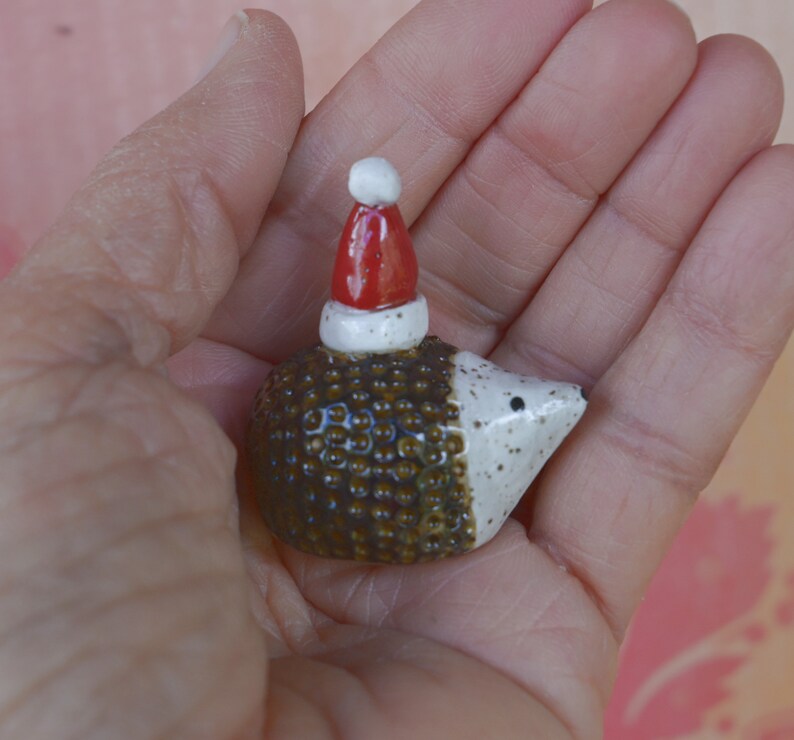 Hedgehog figurine. ONE Santa hedgehog. Ceramic hedgehog. Miniature Christmas hedgehog. Hand sculpted hand painted hedgehog. Xmas hedgehog