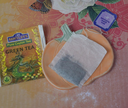 Tea bag rest. Teaspoon rest. Thanksgiving Pumpkin ring holder. Chopstick rest. Thanksgiving trinket dish. Pill holder. Tea light holder.