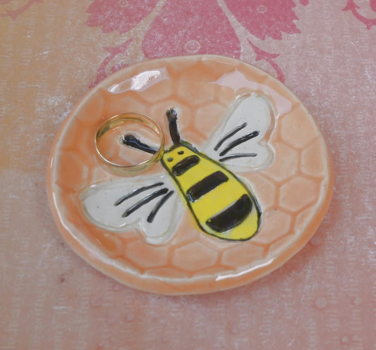 Honeybee teaspoon rest. Hand painted ceramic bee ring holder. Pill holder. Teaspoon rest. Tea bag rest. Tealight holder. Chopstick rest.