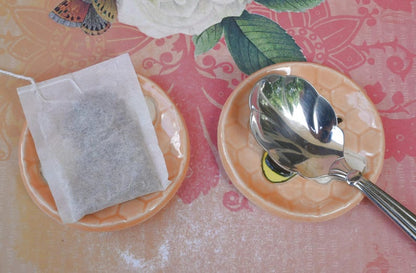 Honeybee teaspoon rest. Hand painted ceramic bee ring holder. Pill holder. Teaspoon rest. Tea bag rest. Tealight holder. Chopstick rest.