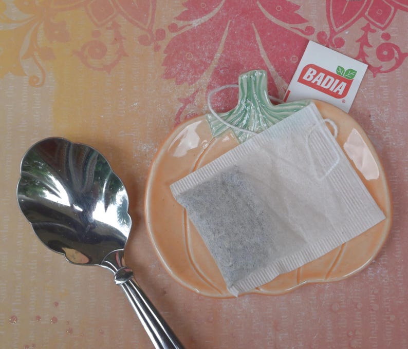 Halloween tea bag rest. Teaspoon rest. Thanksgiving Pumpkin ring holder. Chopstick rest. Trinket dish. Pill holder. Tea light holder.
