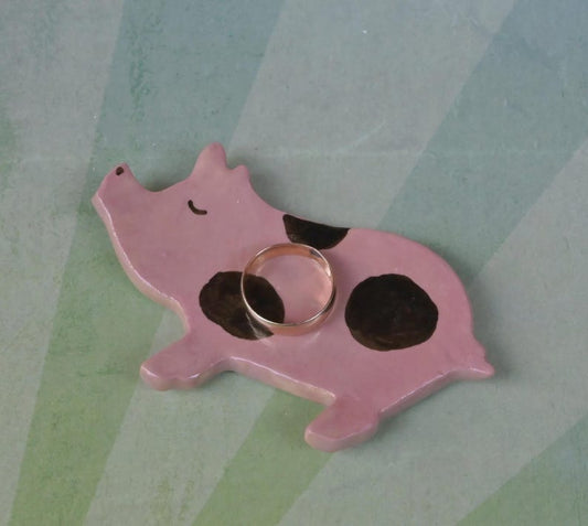 Pig ring holder. ONE Piglet teaspoon rest. Teaspoon rest. Coffee spoon rest. Chopstick rest. Teeny trinket dish. Pill holder.