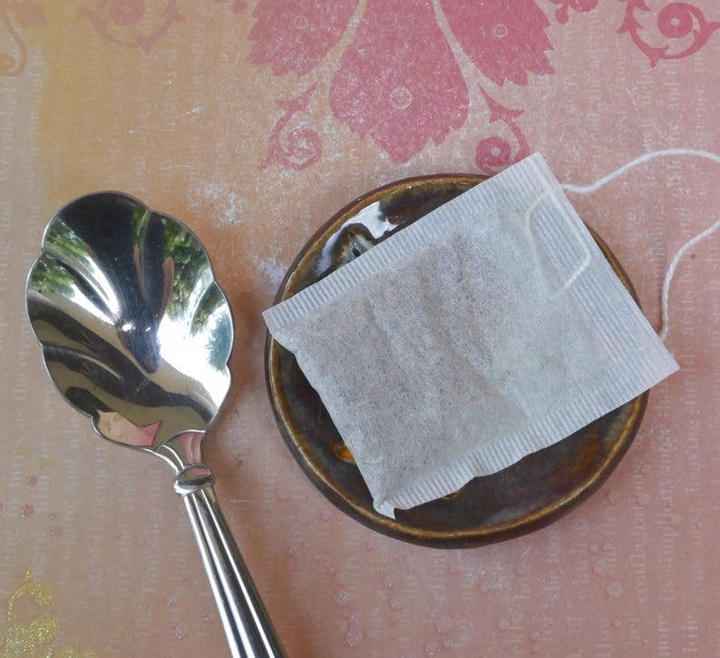 Bunny Rabbit ring holder. Bunny dish. Tea bag holder. Teaspoon rest. Trinket dish. Chopstick rest. Tea light holder. Pill holder