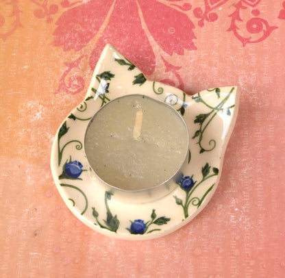 Teeny cat ring holder. Chop stick rest. Teaspoon rest. Tea bag rest. Ceramic cat ring dish. Pill holder. Tea light holder. Blue rose dish.