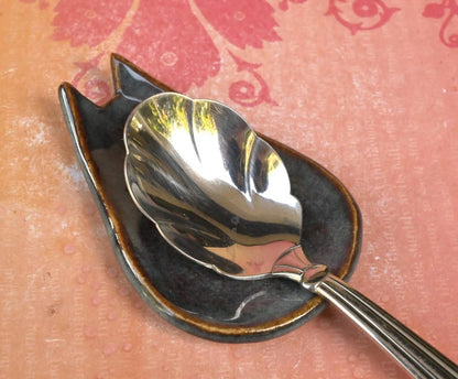 Cat ring holder. Teeny cat trinket dish. Teaspoon rest. Coffee spoon rest. Pill holder. Chop stick rest. Tea light holder. Knife holder