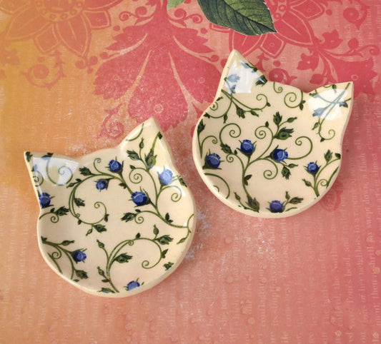 Teeny cat ring holder. Chop stick rest. Teaspoon rest. Tea bag rest. Ceramic cat ring dish. Pill holder. Tea light holder. Blue rose dish.