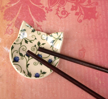 Teeny cat ring holder. Chop stick rest. Teaspoon rest. Tea bag rest. Ceramic cat ring dish. Pill holder. Tea light holder. Blue rose dish.