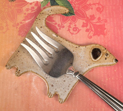 Ceramic dog spoon rest. Dog jewelry/soap holder. Ring holder. Tea bag holder. Teaspoon rest. Tea light holder. Spatula rest.