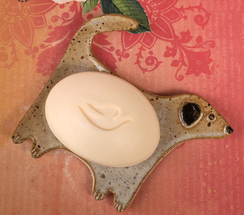 Ceramic dog spoon rest. Dog jewelry/soap holder. Ring holder. Tea bag holder. Teaspoon rest. Tea light holder. Spatula rest.